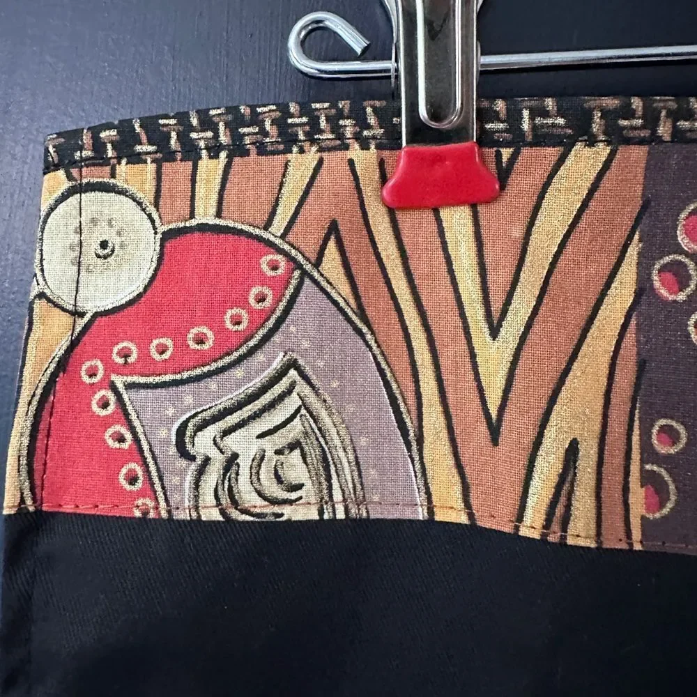 NWT Pair of Cloth Napkins from Africa. Plain black with printed lined edge 16.5”